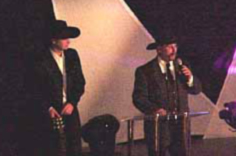Russ Finlay and Paul Brandt at Brookfield Properties 'Make a Wish' charity auction, Calgary, 2001